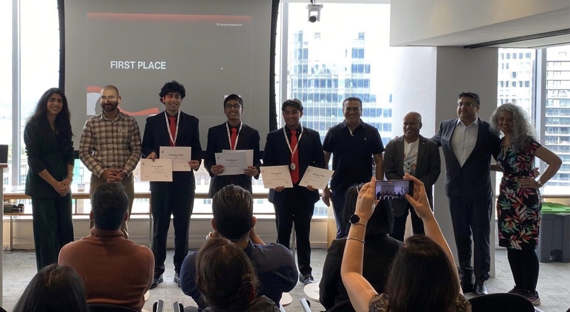TiE Young Entrepreneurs first-place team with mentors and judges
